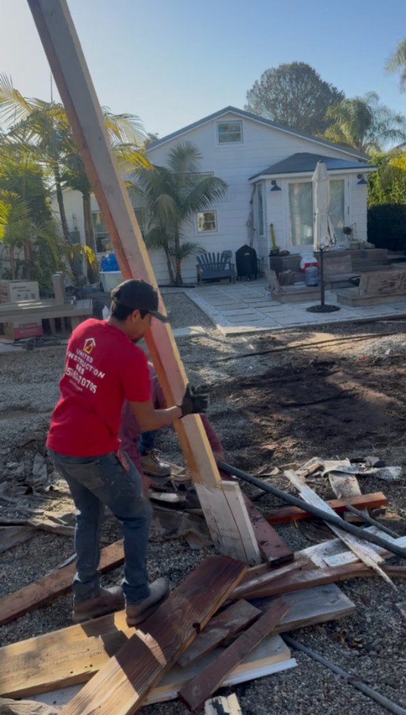 United Construction crew member at a residential job site